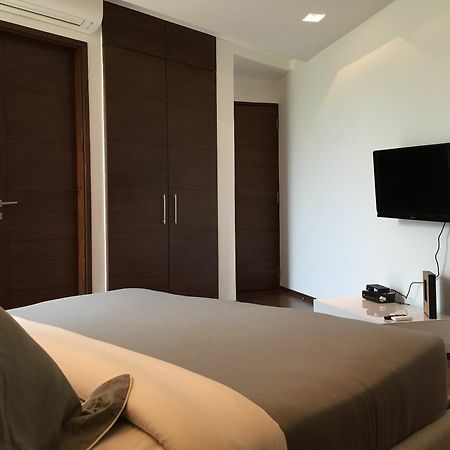 Calem Grove Hotel Candolim Bagian luar foto